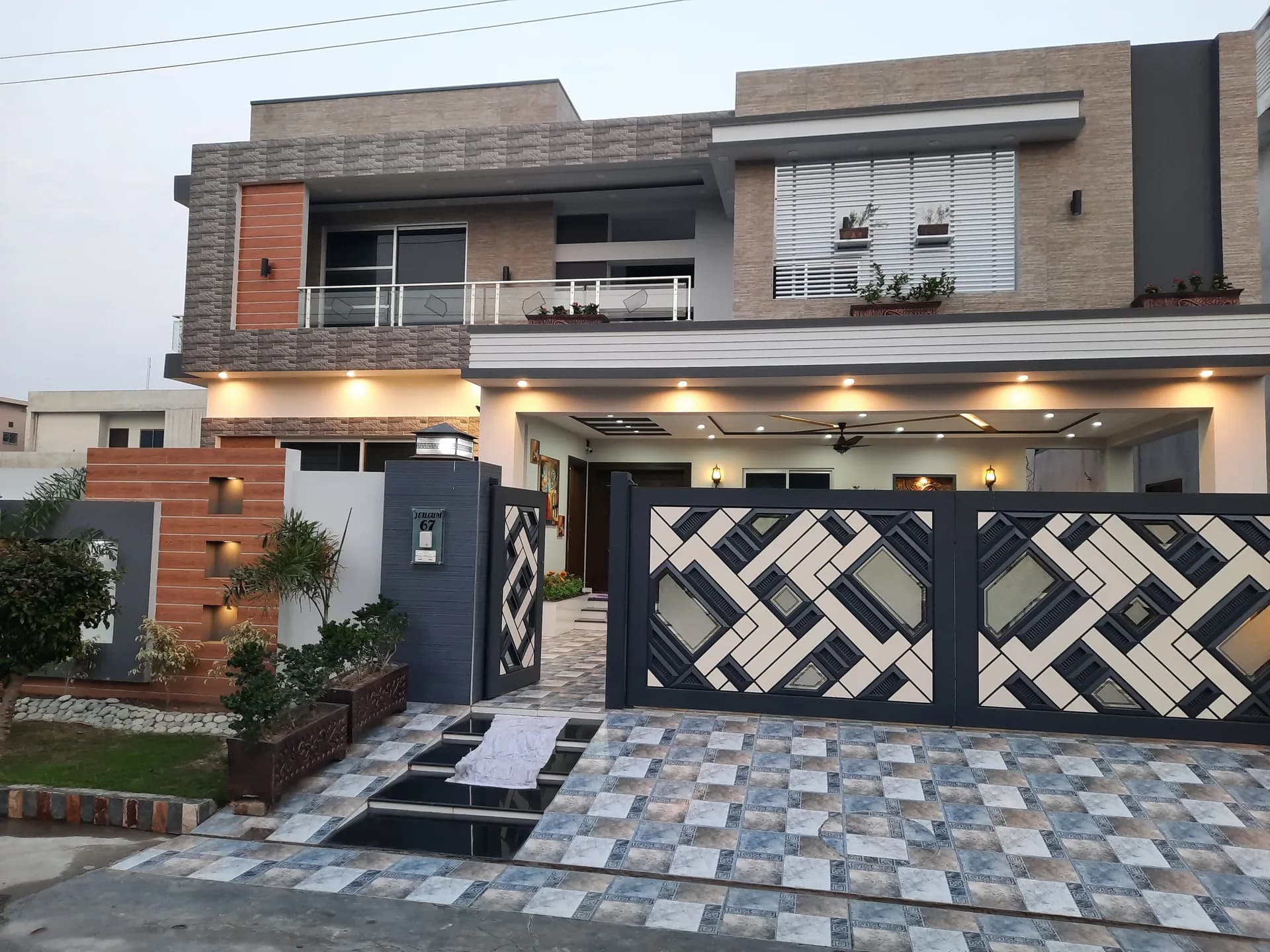 67 Jehlum — A refined modern build centred on a gold-accented drawing room, DC Colony, Gujranwala